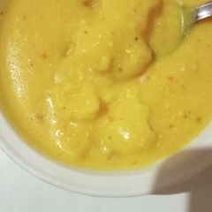 A picture of Kadhi with pakodi.