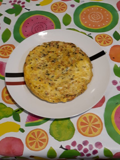 Una foto de Tortilla a la jardinera