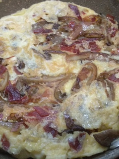 Una foto de Tortilla de setas y jamón