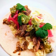 A picture of Pink Pickled Taco Onions.
