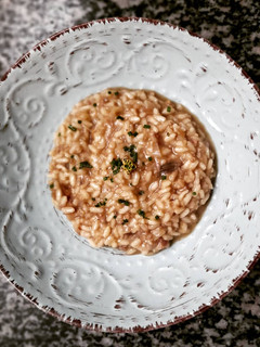 Una foto de Risotto de pies de cerdo y boletus
