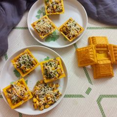 A picture of Cheese corn chaat.