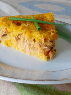 Una foto de Polenta de Calabaza (Auyama) con pescado desmenuzado
