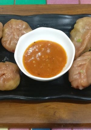 A picture of Beetroot momos,A healthy version.