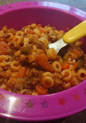 A picture of Bolognese with vegetables.