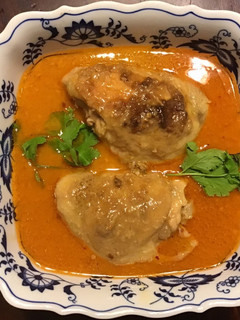 A picture of California Farm Chicken Thighs in Coconut Cream on Pasta.