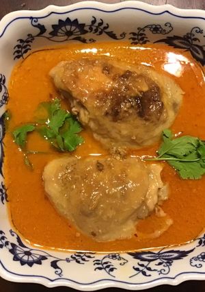 A picture of California Farm Chicken Thighs in Coconut Cream on Pasta.