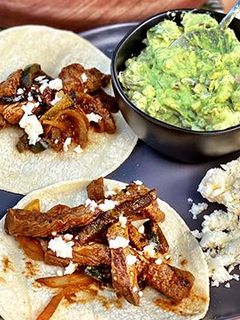 A picture of Roasted Hatch Chile Wagyu Steak Fajitas.