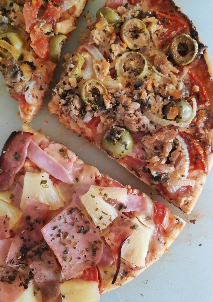 Una foto de Pizza hawaiana y pizza napolitana