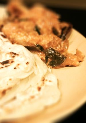 A picture of Kerala Porotta (layered flat indian bread).