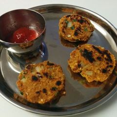 A picture of Oats and moong dal tikki.