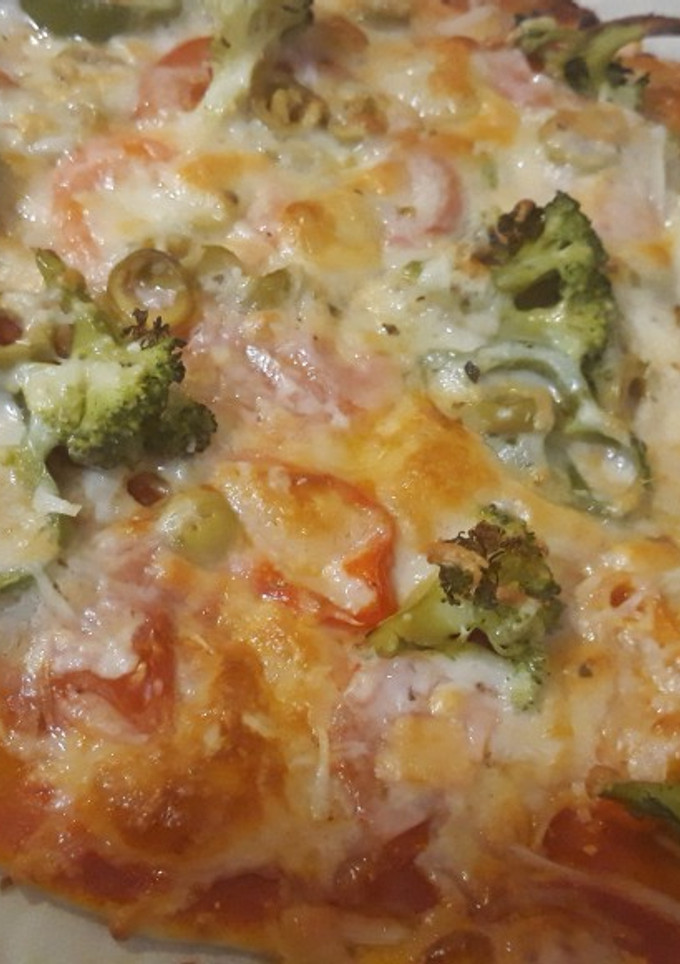 Una foto de Pizza vegetariana