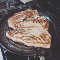 New York Strip SteaksWith A1 steak sauce and Siracha A picture of New York Strip SteaksWith A1 steak sauce and Siracha.