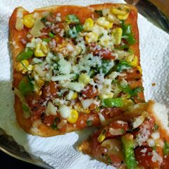 A picture of Mini Cheese bread pizza.