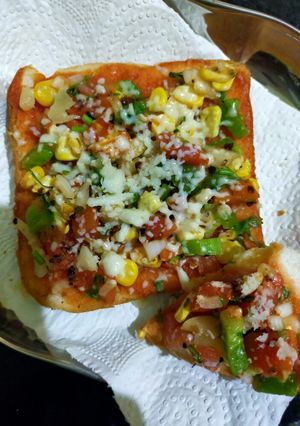 A picture of Mini Cheese bread pizza.