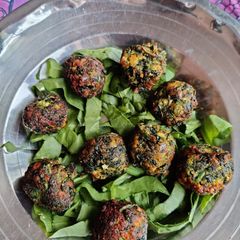 A picture of Palak panner kofta.