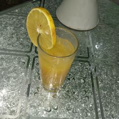 A picture of Mango and orange juice.