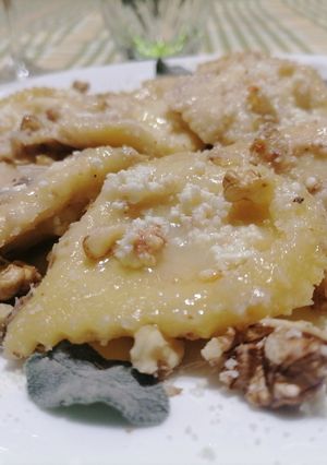 A picture of Ravioli Filled with Ricotta, Gorgonzola, Walnuts, Sage, and Ricotta Salata.