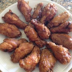 A picture of Asian style sweet and spicy wings .