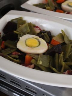 Una foto de Judías verdes cocidas con jamón y huevo