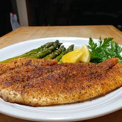 A picture of Oven Baked Blackened Snapper w/ Asparagus.