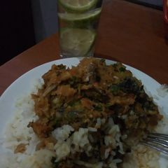 A picture of Carrots stew with rice.