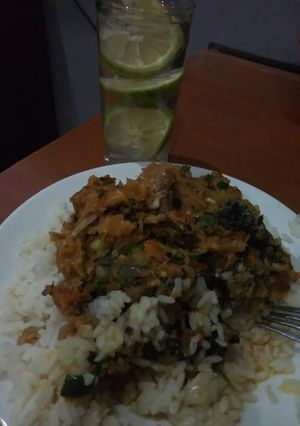 A picture of Carrots stew with rice.