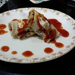 A picture of ران روسٹ چپاتی رول.