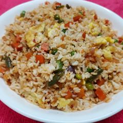 A picture of Schezwan Egg Fried Rice.