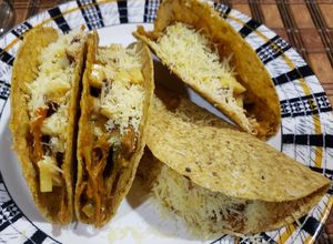 Una foto de Tacos de carne desmechada
