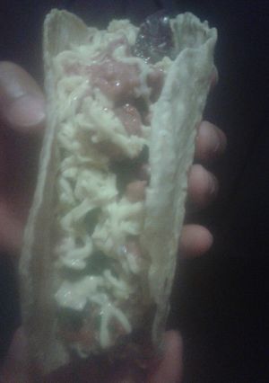 Una foto de Tacos de chorizo y morcilla