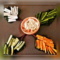 A picture of Salad with Dip.