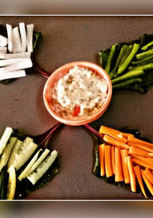 A picture of Salad with Dip.