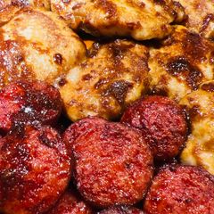 A picture of Broiled Chicken Thighs with Polska Kielbasa.