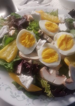 A picture of Garden salad with apricot dressing.