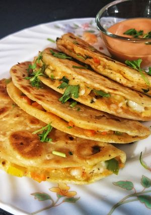 A picture of Quesadillas in two different ways (Aloo/ vegetables).