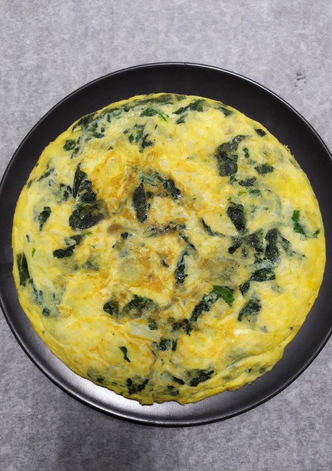 Una foto de Tortilla de patatas y espinacas