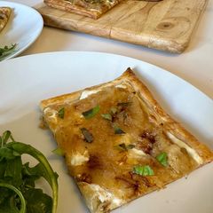 A picture of Goat Cheese and Caramelized Onion Tart.