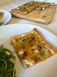 A picture of Goat Cheese and Caramelized Onion Tart.