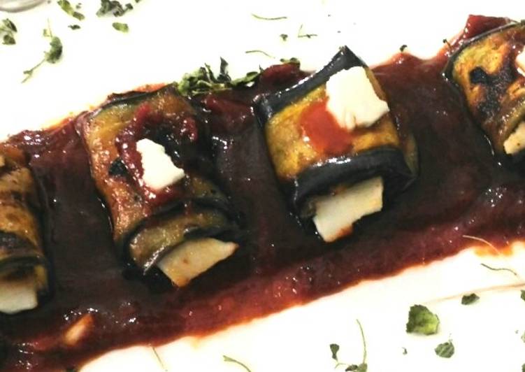 Cheesey brinjal roll in tomato sauce