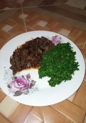 A picture of Green vegetables and wet fry liver.