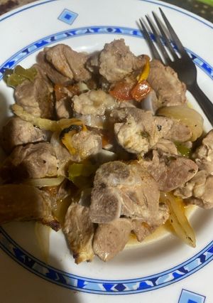 Una foto de Choto en salsa al horno