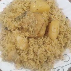A picture of Desi style chicken pulao.