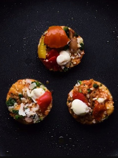 A picture of Mini bread pizza with egg white.