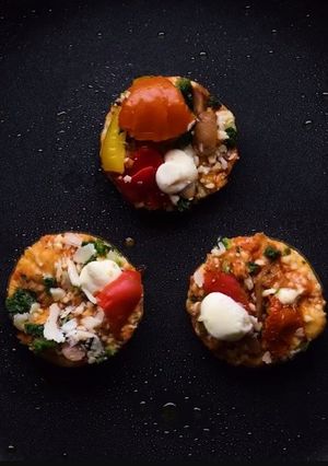 A picture of Mini bread pizza with egg white.