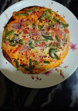 A picture of Homemade Tandoori pizza.