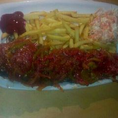 A picture of Grilled fish n chips with salad.
