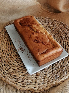 Una foto de Bizcocho de mandarina y crema de almendras