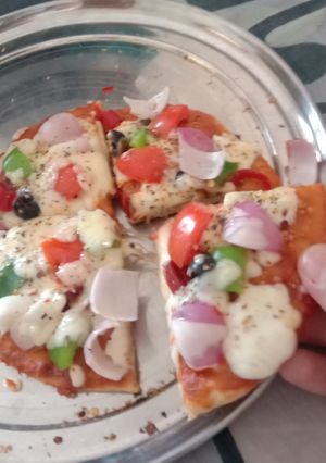 A picture of Yummy pizza with homemade base.