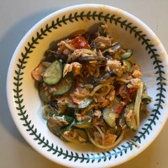 A picture of Spaghetti with Flaked Trout, Baby Tomatoes, Mushrooms, Garlic, Courgettes & Chilli.